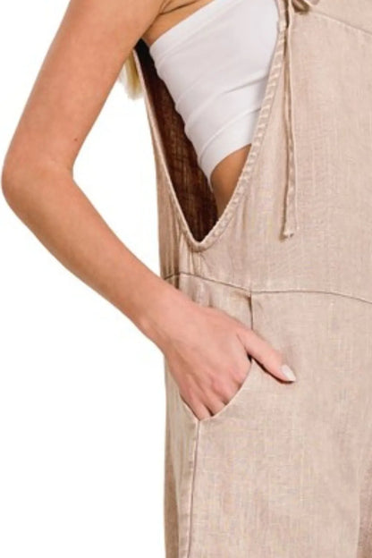 Zenana washed linen knot strap romper featuring a relaxed fit and adjustable straps, perfect for casual summer wear.