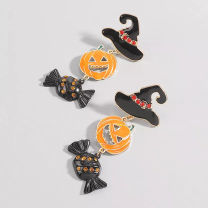 Halloween pumpkin earrings in 18K gold-plated alloy featuring festive orange pumpkin design and intricate detailing.