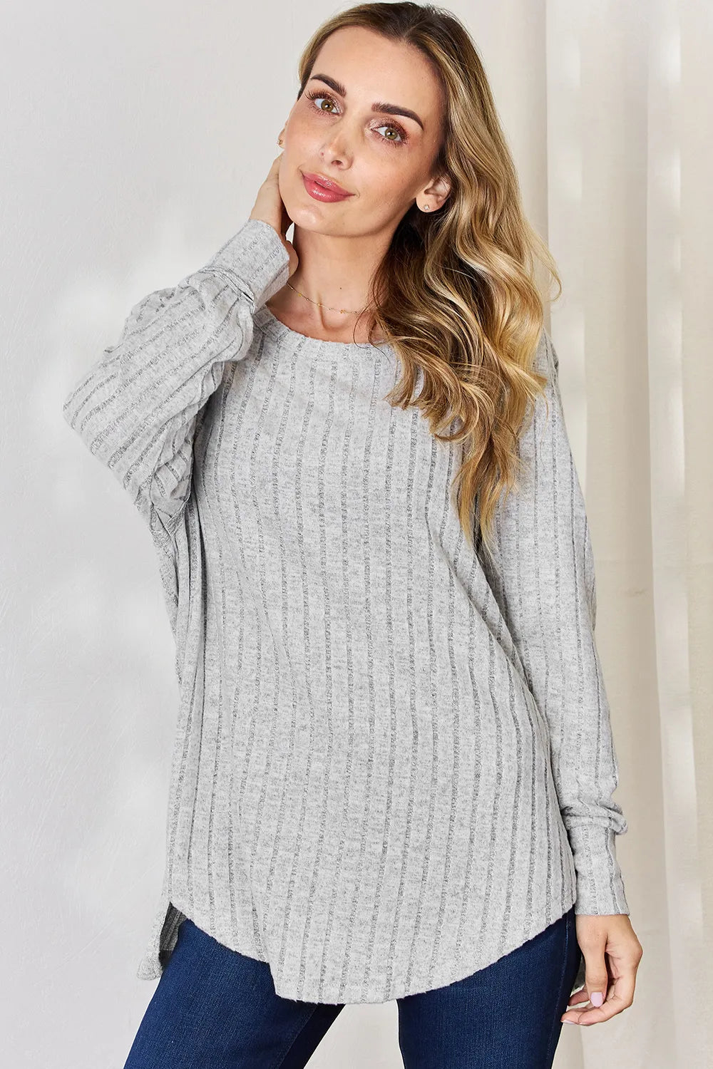 Trendsi Basic Bae full-size ribbed round neck slit T-shirt, beige color, soft fabric, casual fit, long sleeves, ribbed texture.