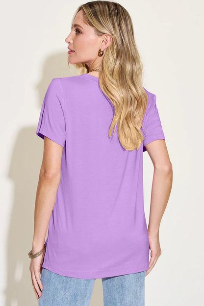 Basic Bae Bamboo V-Neck High-Low T-Shirt by Trendsi, full-size, in natural bamboo fabric, featuring a relaxed fit and stylish V-neck design.