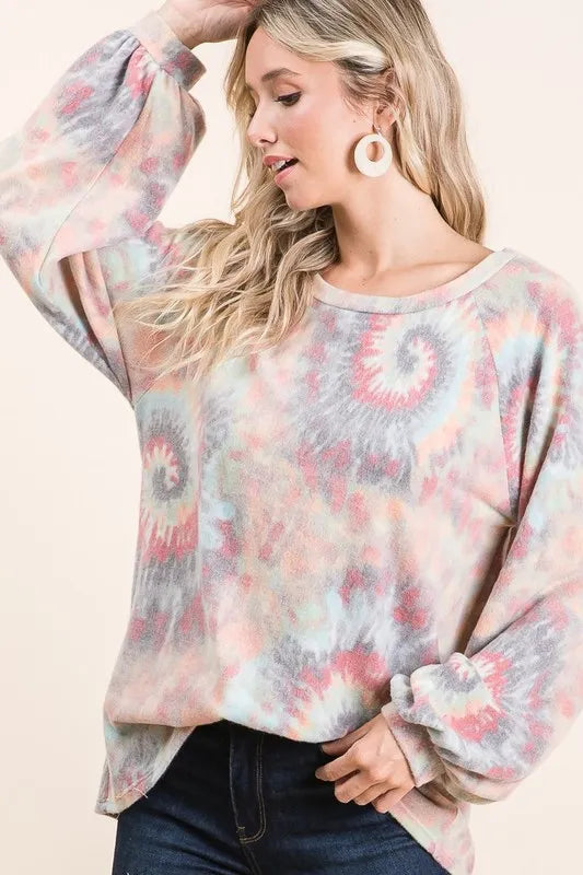 Brushed tie dye print top with puff sleeves from Trendsi, featuring a relaxed fit and vibrant pattern.