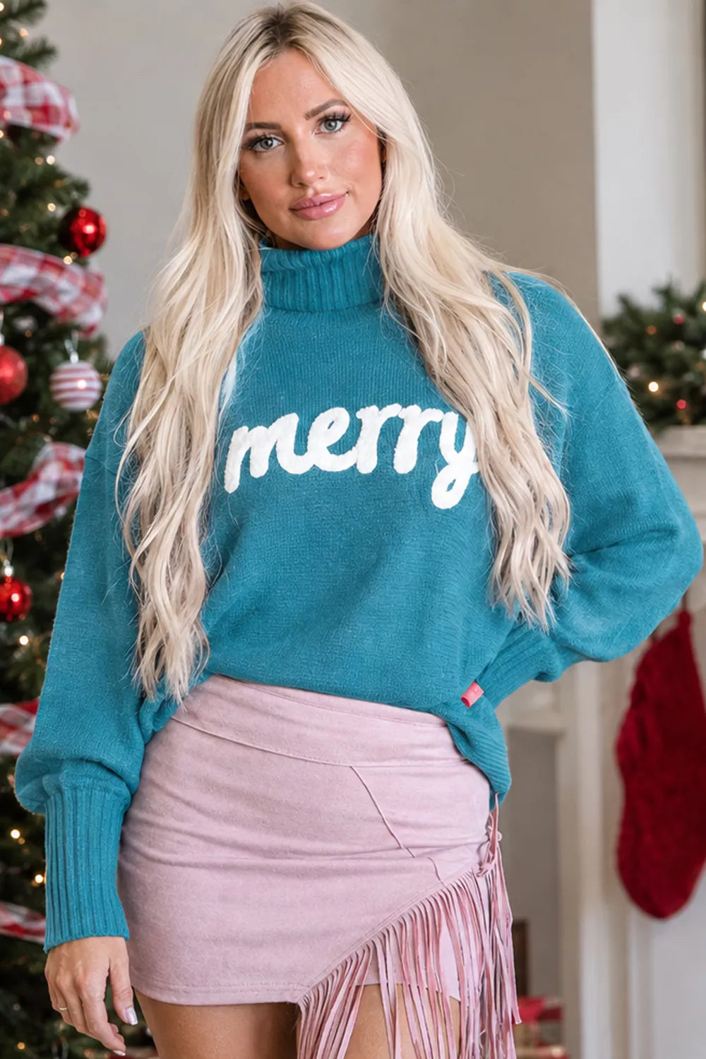 Red Christmas turtleneck sweater with "Merry Christmas" print, long sleeves, and cozy fit from Trendsi's Double Take collection.
