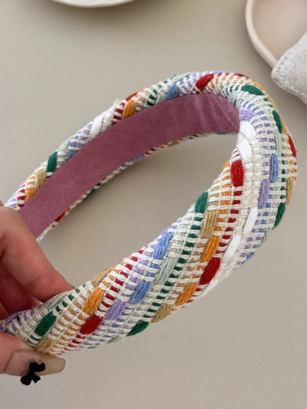 Colorful polyester hair headband with vibrant patterns, ideal for casual or stylish hair accessory looks.