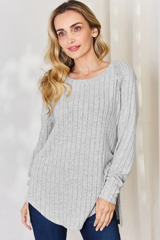 Basic Bae full size ribbed round neck slit T-shirt by Trendsi, featuring a comfortable ribbed fabric and subtle side slit detail.