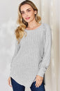 Basic Bae full size ribbed round neck slit T-shirt by Trendsi, featuring a comfortable ribbed fabric and subtle side slit detail.