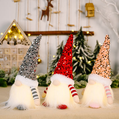Sequin light-up faceless gnome by Trendsi with shiny sequins and illuminated features, perfect for festive home decor.