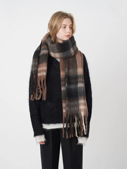 Polyester plaid scarf with fringed edges from Trendsi, featuring a stylish pattern and soft texture for versatile wear.