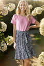 Heimish plus size mini dress with short sleeves, solid and animal print fabric, featuring a stylish and comfortable design.