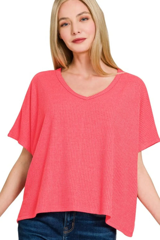 Zenana ribbed V-neck short-sleeve knit top in neutral color, showcasing its fitted V-neck design and ribbed texture.