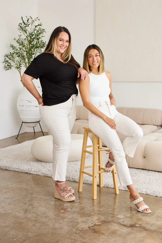 RFM Mini Mia high waist tummy control raw hem jeans from Trendsi, full size denim with a fitted silhouette and distressed hem detail.