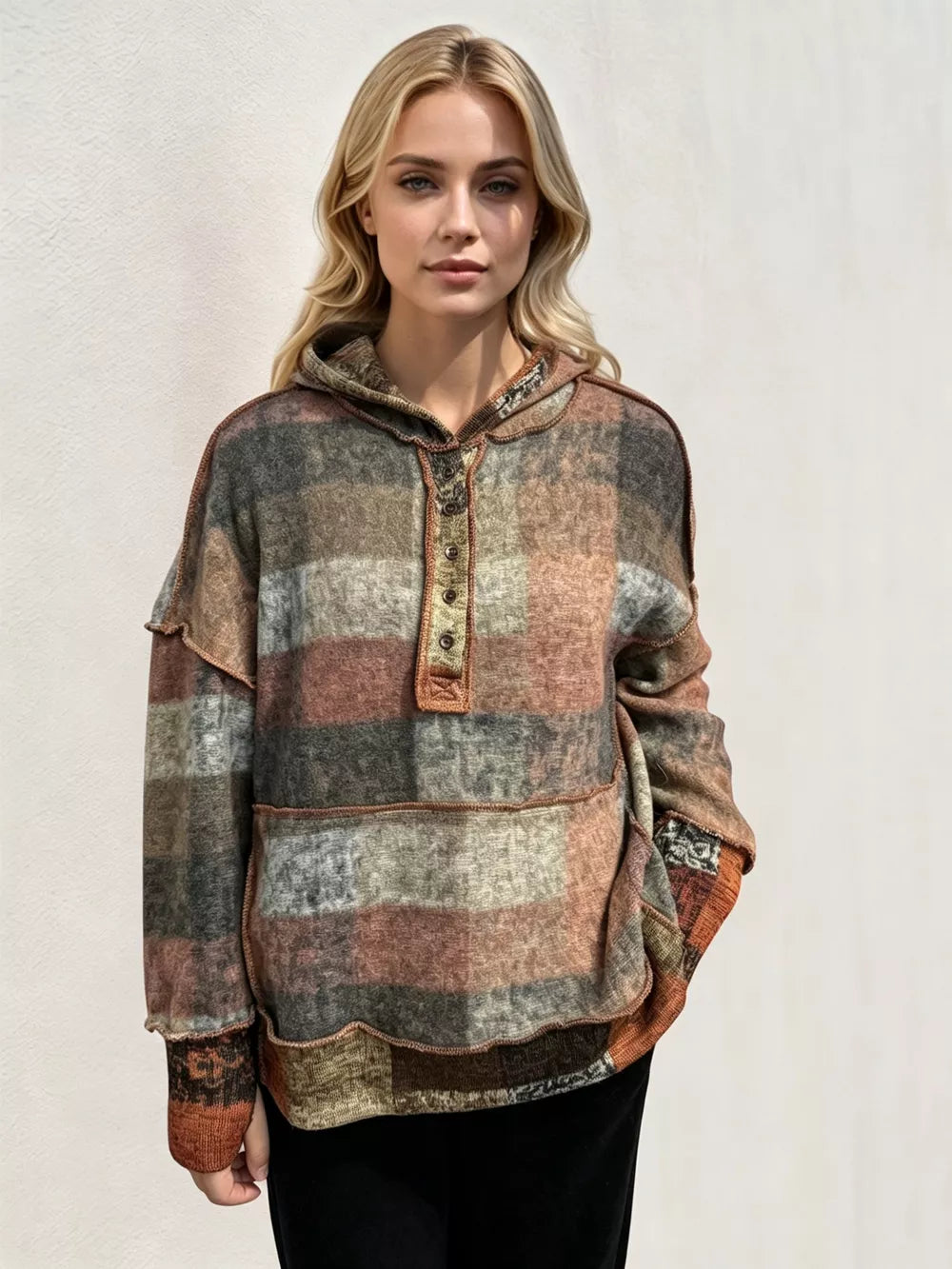 Plus size fleece hoodie with plaid pattern, dropped shoulder design, and cozy fit from Trendsi's Double Take collection.