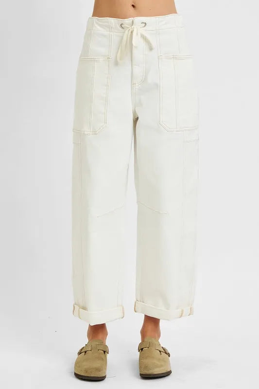 Plus size RISEN high rise crop wide barrel cargo pocket jeans by Trendsi with a full size fit and stylish distressed details.