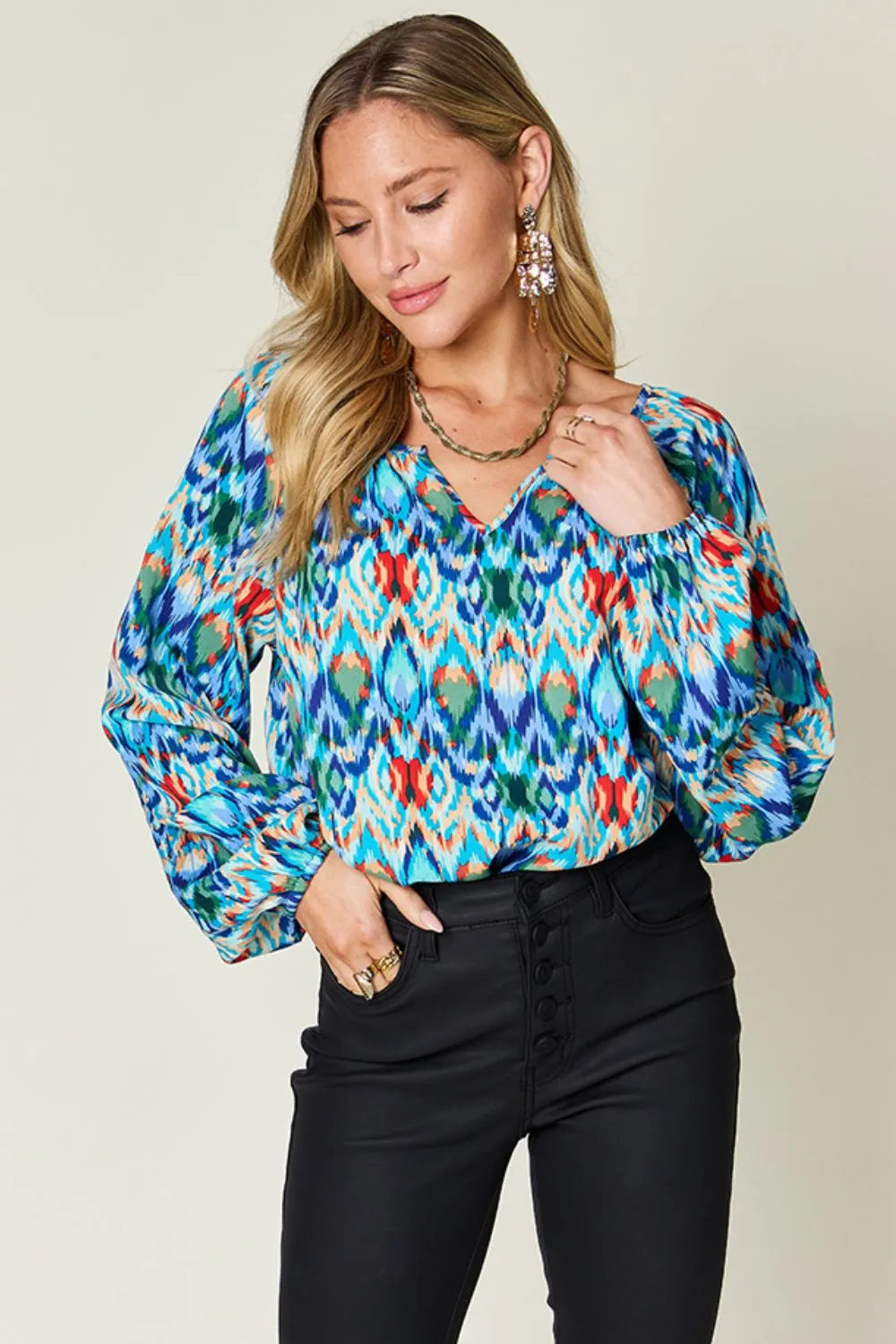 Printed balloon sleeve blouse from Trendsi featuring a double take full size design with bold print and balloon sleeves.