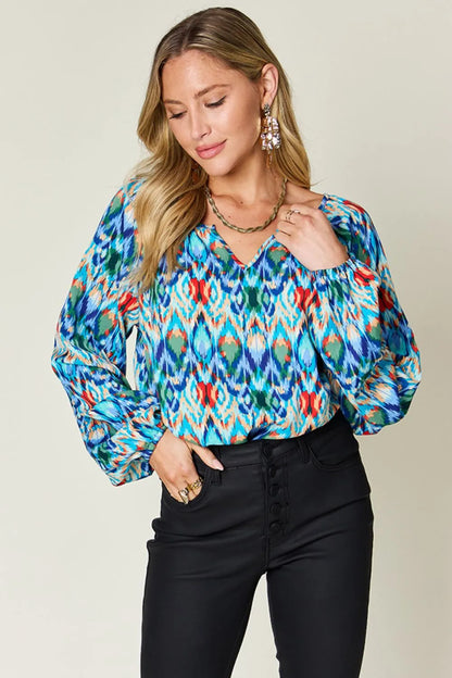 Printed balloon sleeve blouse from Trendsi featuring a double take full size design with bold print and balloon sleeves.
