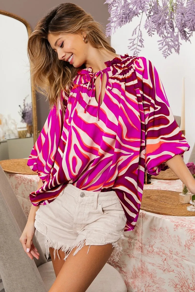 Fuchsia pink zebra satin top with tied neck and half balloon sleeves, stylish and trendy women's blouse by Trendsi.