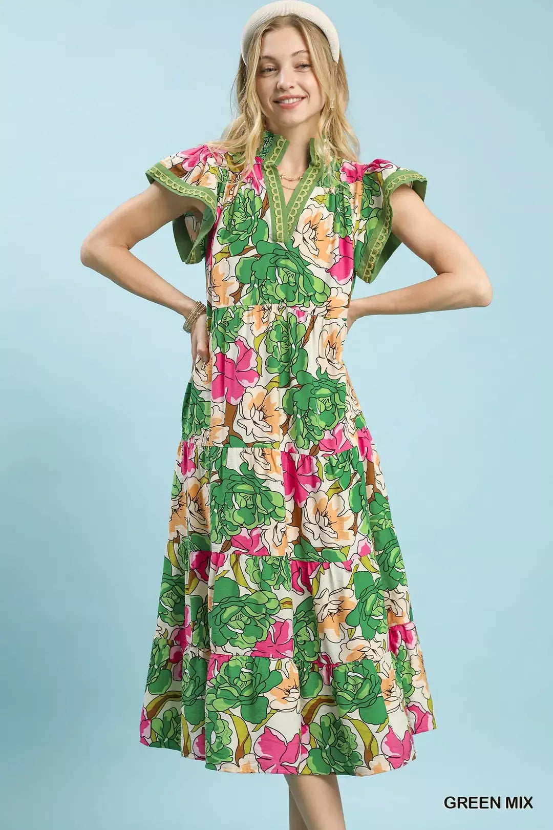 Green Umgee Mix bold floral tiered midi dress with a flowy silhouette and vibrant floral pattern, perfect for spring and summer.