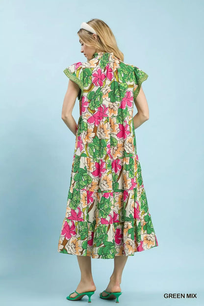 Green Umgee Mix Bold Floral Tiered Midi Dress featuring vibrant floral patterns and a relaxed, flowing silhouette.