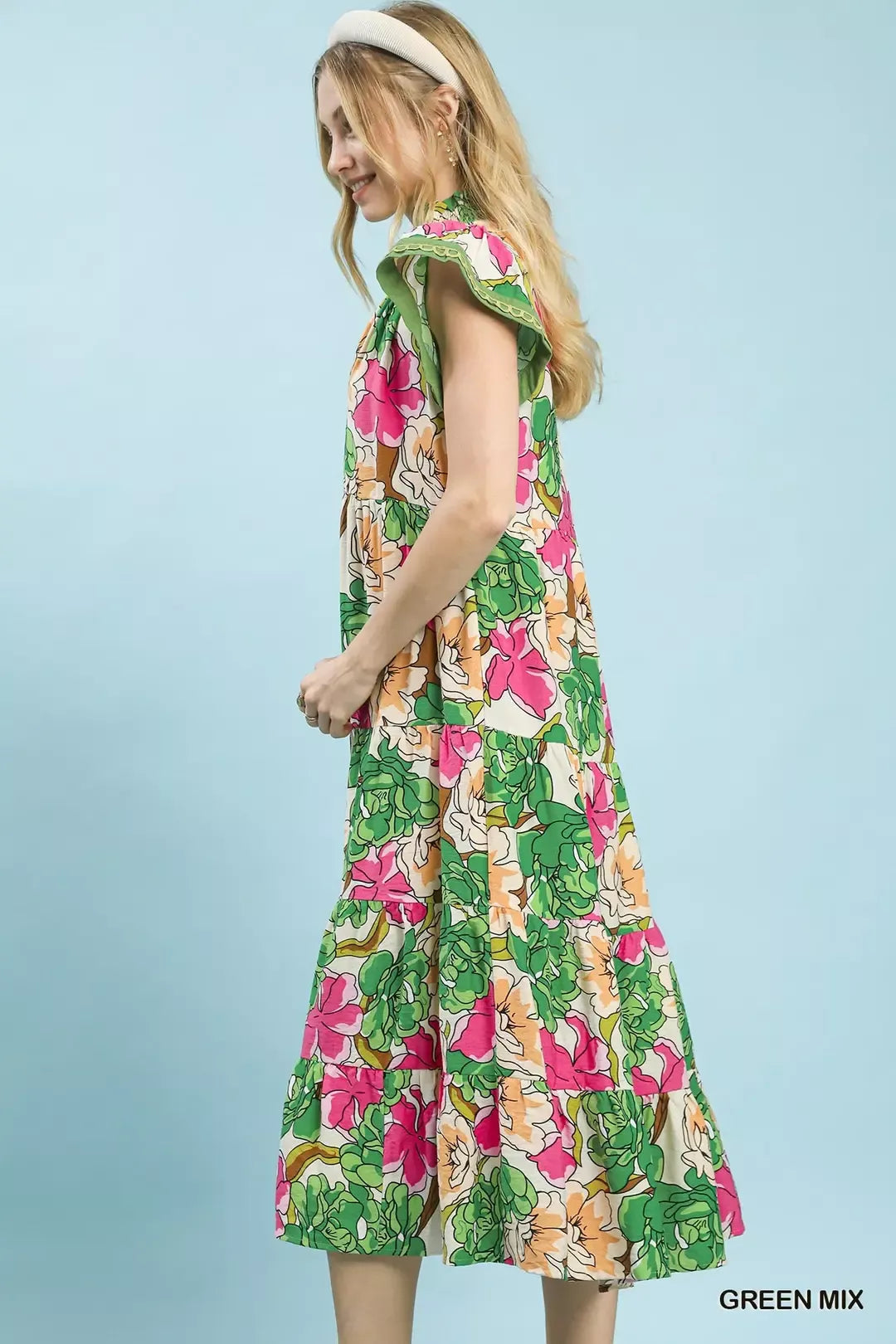 Green Umgee Mix Bold Floral Tiered Midi Dress with a flowy silhouette and vibrant floral pattern, perfect for casual or semi-formal wear.