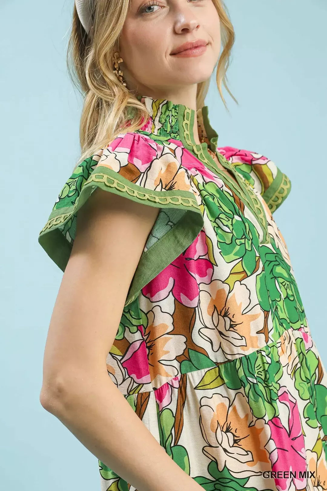 Green Umgee Mix Bold Floral Tiered Midi Dress with ruffled layers and vibrant floral pattern, perfect for casual or summer wear.