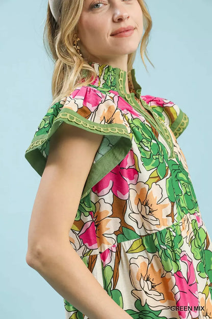 Green Umgee Mix Bold Floral Tiered Midi Dress with ruffled layers and vibrant floral pattern, perfect for casual or summer wear.