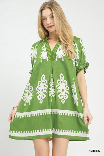 Green Umgee two-tone border print mini dress with short sleeves and relaxed fit, perfect for casual wear.