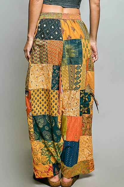 Honey multi-polyester printed patchwork wide-leg pants with adjustable side drawstring from Trendsi.