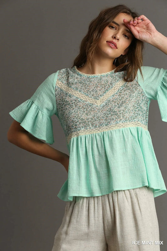 Ice mint floral lace-trimmed babydoll top with half sleeves by Umgee, featuring a flowy, feminine design and delicate lace details.