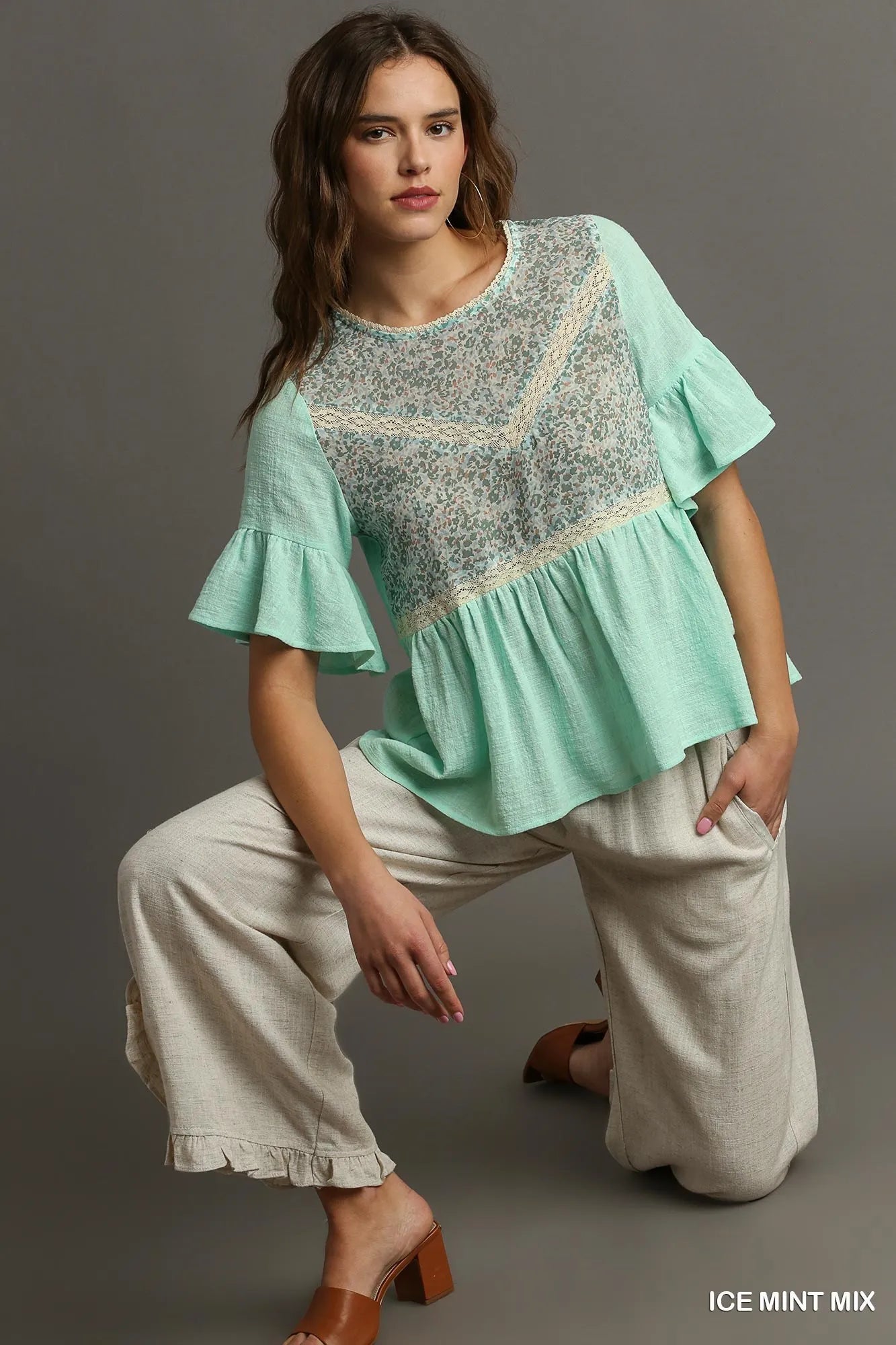Ice mint floral lace-trimmed babydoll top with half sleeves, stylish and lightweight, by Umgee.