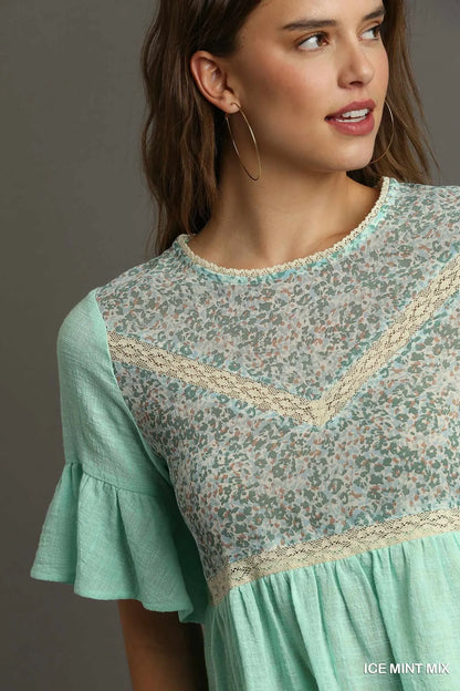 Ice mint floral lace-trimmed babydoll top with half sleeves by Umgee, featuring delicate lace details and a relaxed fit.