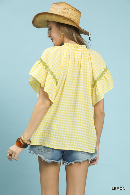 Lemon yellow Umgee Gingham Lace Trim Top with short sleeves and delicate lace details, casual and stylish women's blouse.
