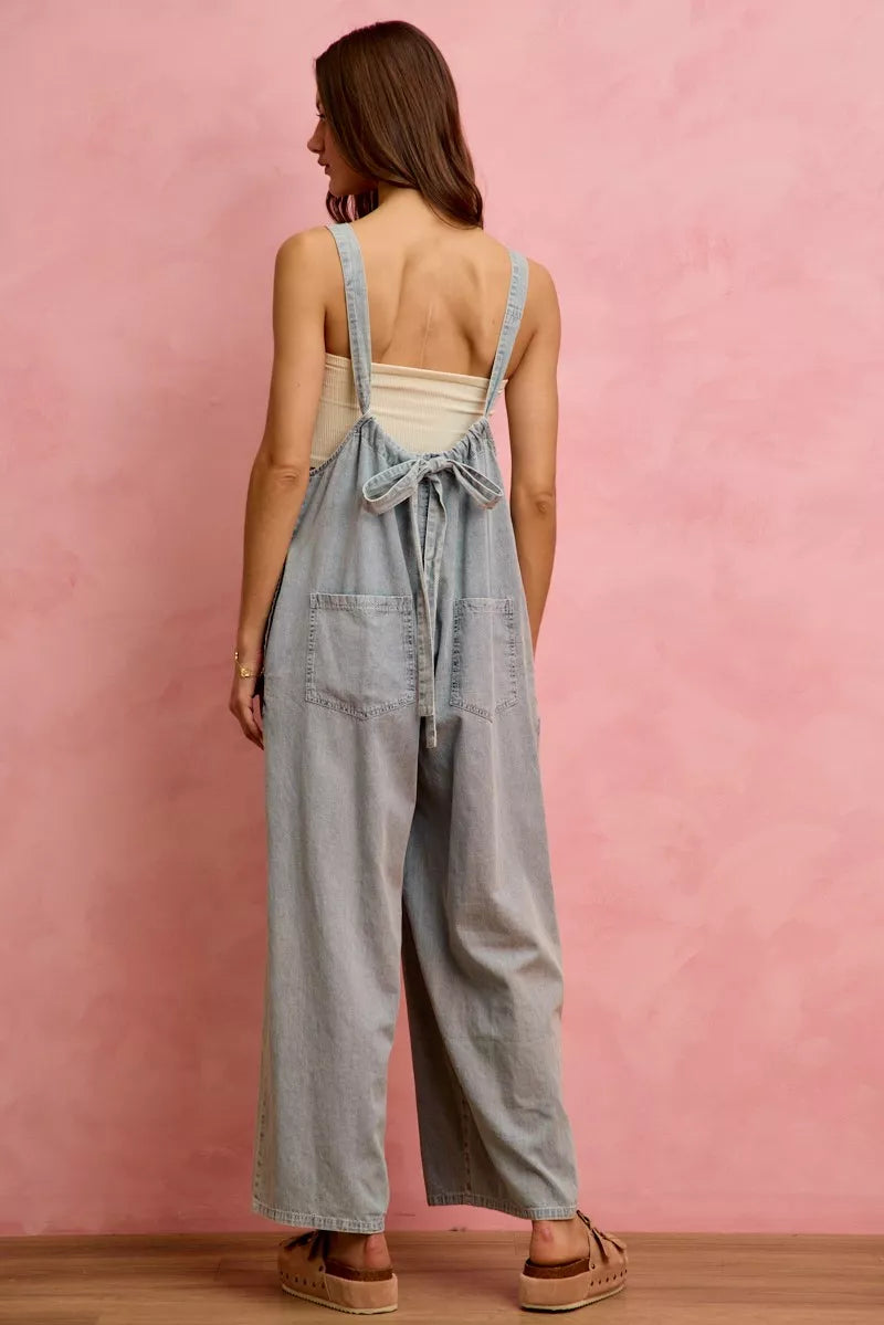 Light blue SO ME wide-leg lightweight denim overalls with adjustable straps and front pockets, styled for casual wear.