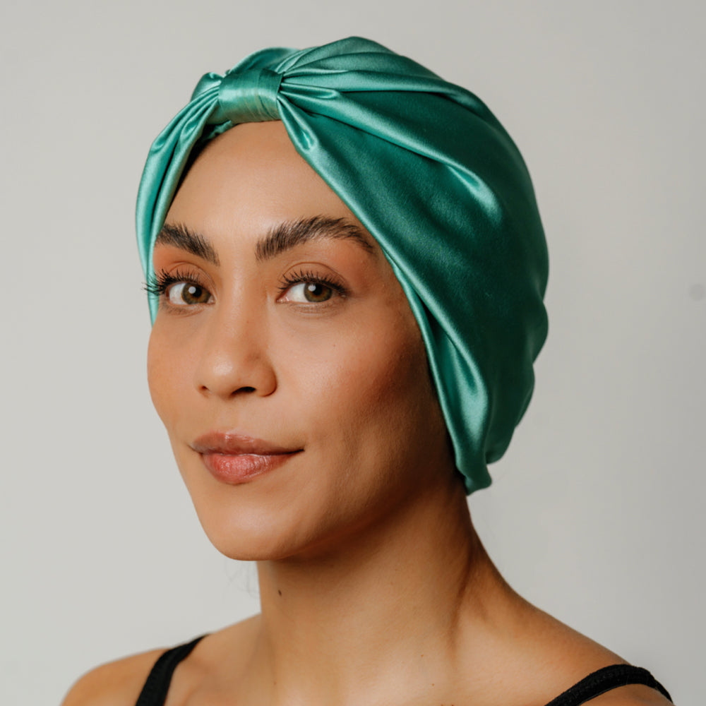LINA LENNOX organic silk hair bonnet in Jade Green, soft and smooth for protecting hair during sleep.