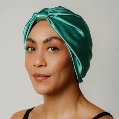 LINA LENNOX organic silk hair bonnet in Jade Green, soft and smooth for protecting hair during sleep.
