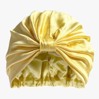 LINA LENNOX organic silk hair bonnet in sunshine yellow, soft and smooth with a snug fit for hair protection.