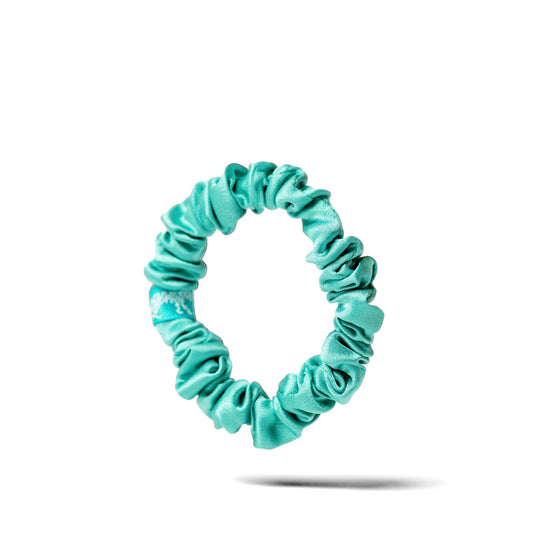 Organic silk small scrunchie in jade green by Lina Lennox, featuring a soft, smooth texture and gentle elastic fit.
