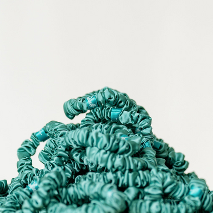 Organic silk small scrunchie by LINA LENNOX in jade green, soft and smooth fabric ideal for gentle hair styling.