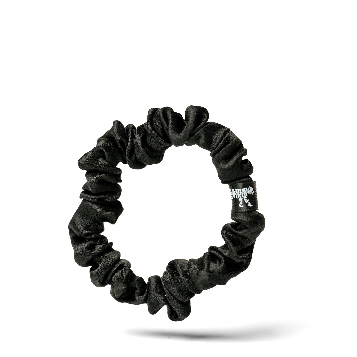 Organic silk small scrunchie by LINA LENNOX in onyx black, soft and elegant hair accessory made from natural silk.