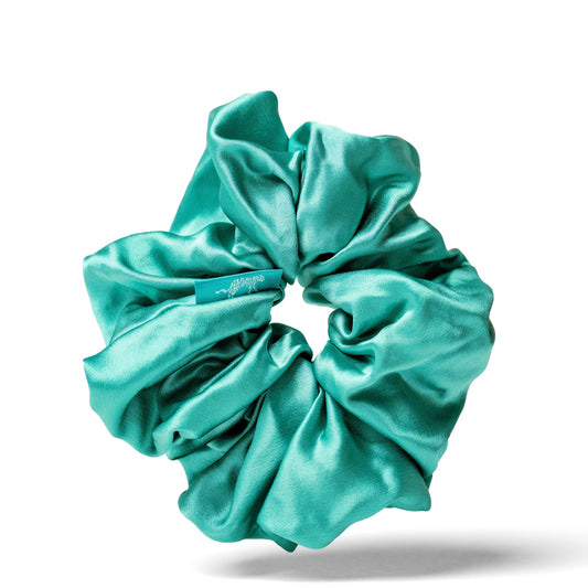 Organic silk oversized scrunchie by Lina Lennox in vibrant jade green, soft and plush for gentle hair hold.
