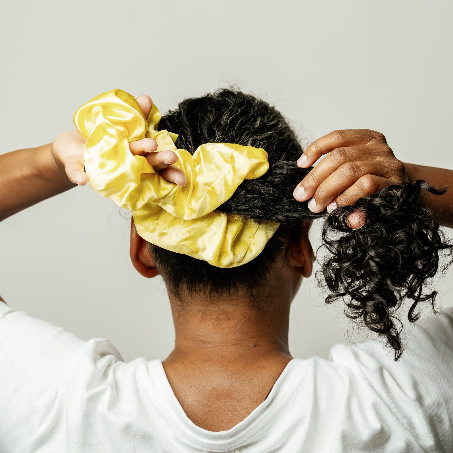 Organic silk oversized scrunchie from LINA LENNOX in vibrant sunshine yellow, soft and stylish hair accessory.