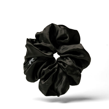 Oversized black organic silk scrunchie by LINA LENNOX, soft and smooth with a luxurious Onyx Black finish.