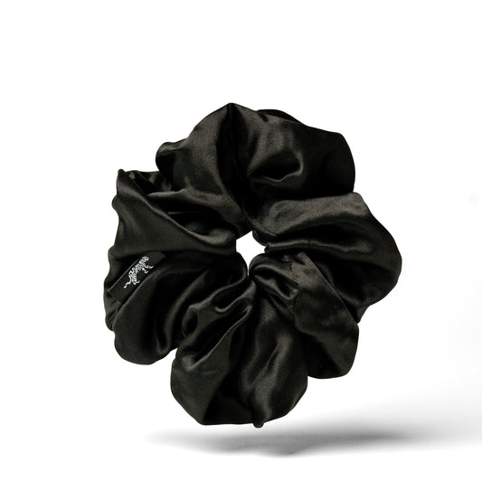 Oversized black organic silk scrunchie by LINA LENNOX, soft and smooth with a luxurious Onyx Black finish.