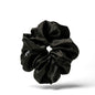 Oversized black organic silk scrunchie by LINA LENNOX, soft and smooth with a luxurious Onyx Black finish.