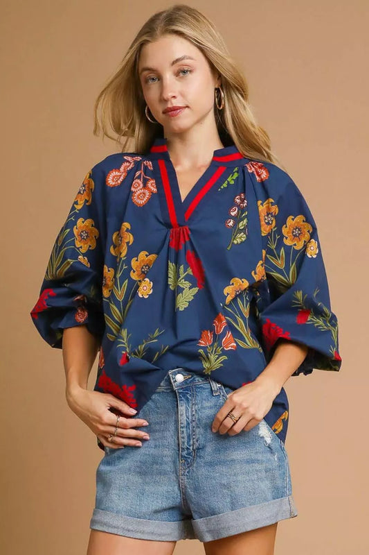 Midnight floral print Umgee blouse with flounce sleeves, stylish and lightweight perfect for casual or dressy occasions.