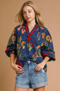 Midnight floral print Umgee blouse with flounce sleeves, stylish and lightweight perfect for casual or dressy occasions.