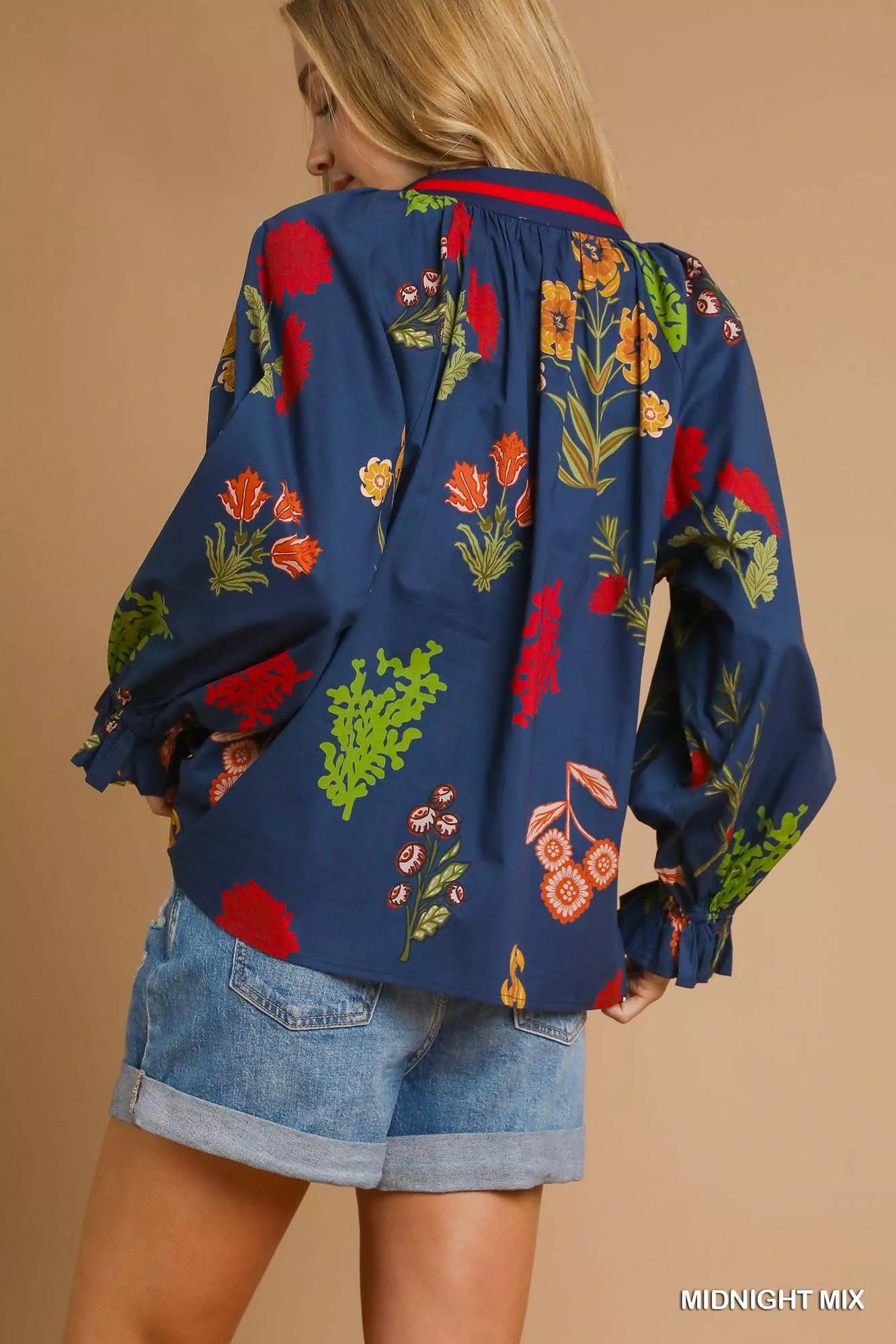 Midnight mix floral print Umgee blouse with flounce sleeves, stylish and lightweight for casual or dressy occasions.