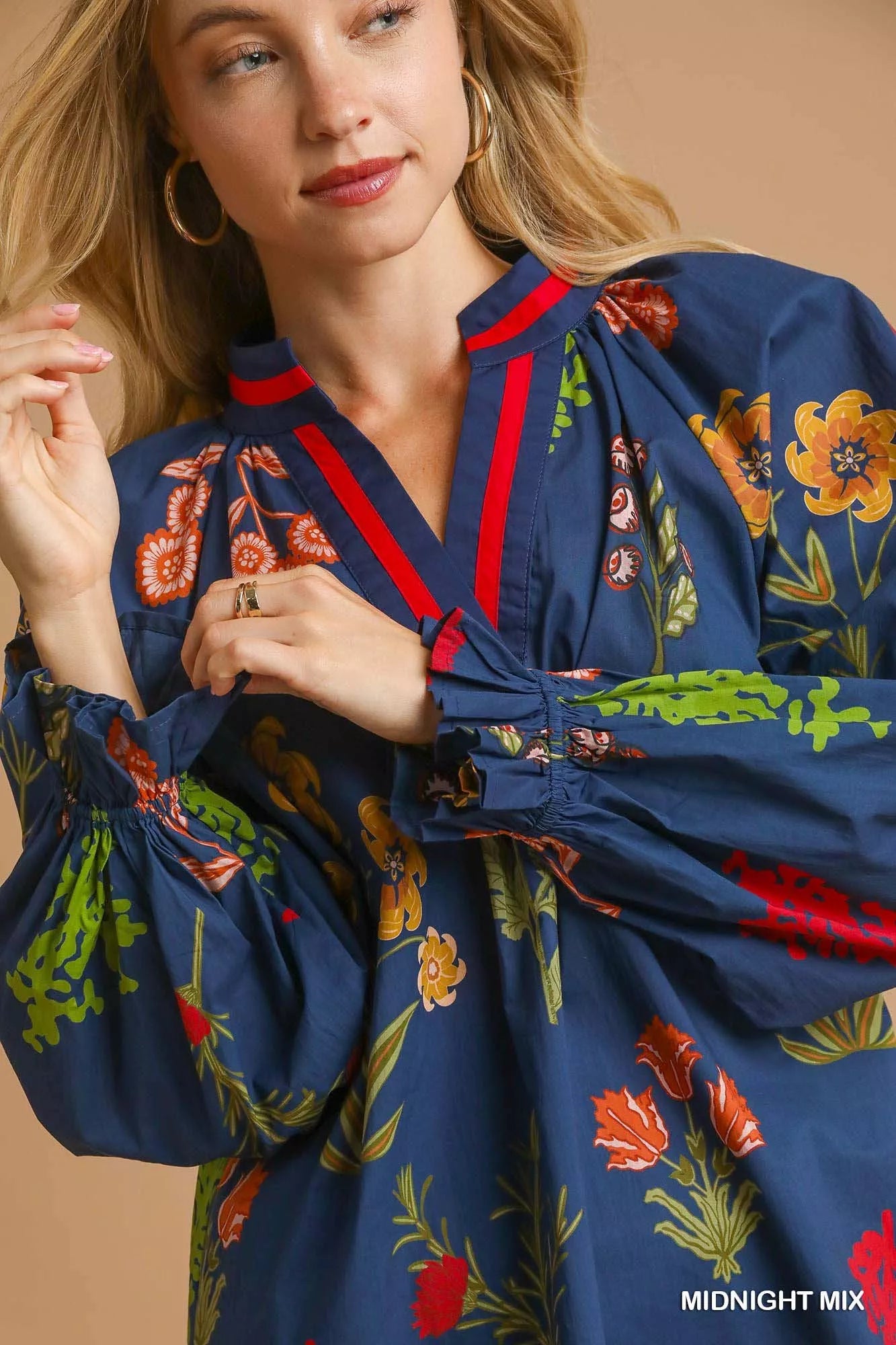 Midnight floral print Umgee blouse with flounce sleeves, casual women's top, trendy and comfortable for everyday wear.