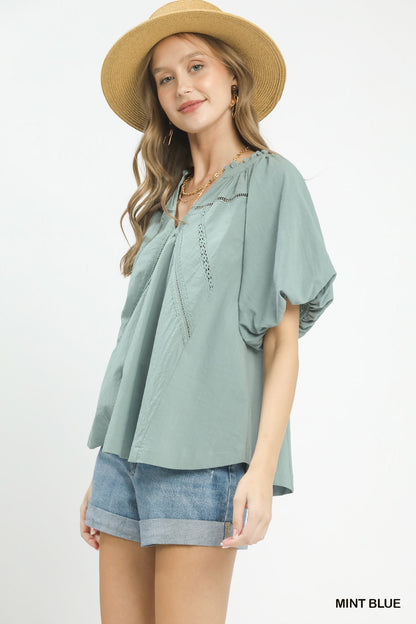 Mint blue Umgee lace inset puff sleeve boho blouse with relaxed fit and feminine design, perfect for casual and bohemian styles.
