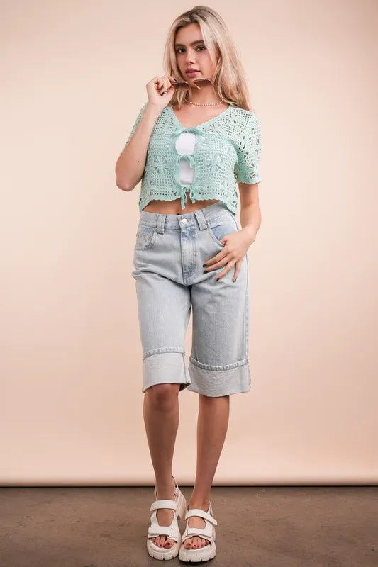Mint green Very J crochet crop top with front tie, short sleeves, and textured knit design, perfect for casual summer wear.