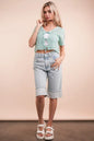 Mint green Very J crochet crop top with front tie, short sleeves, and textured knit design, perfect for casual summer wear.