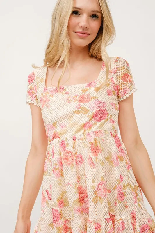 Trendsi floral fishnet dress with square neckline and tiered design, featuring a colorful floral pattern and layered skirt.